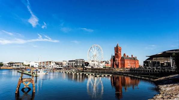 Cardiff Bay waterfront with the Pierhead Building and the Wales Millennium Wheel