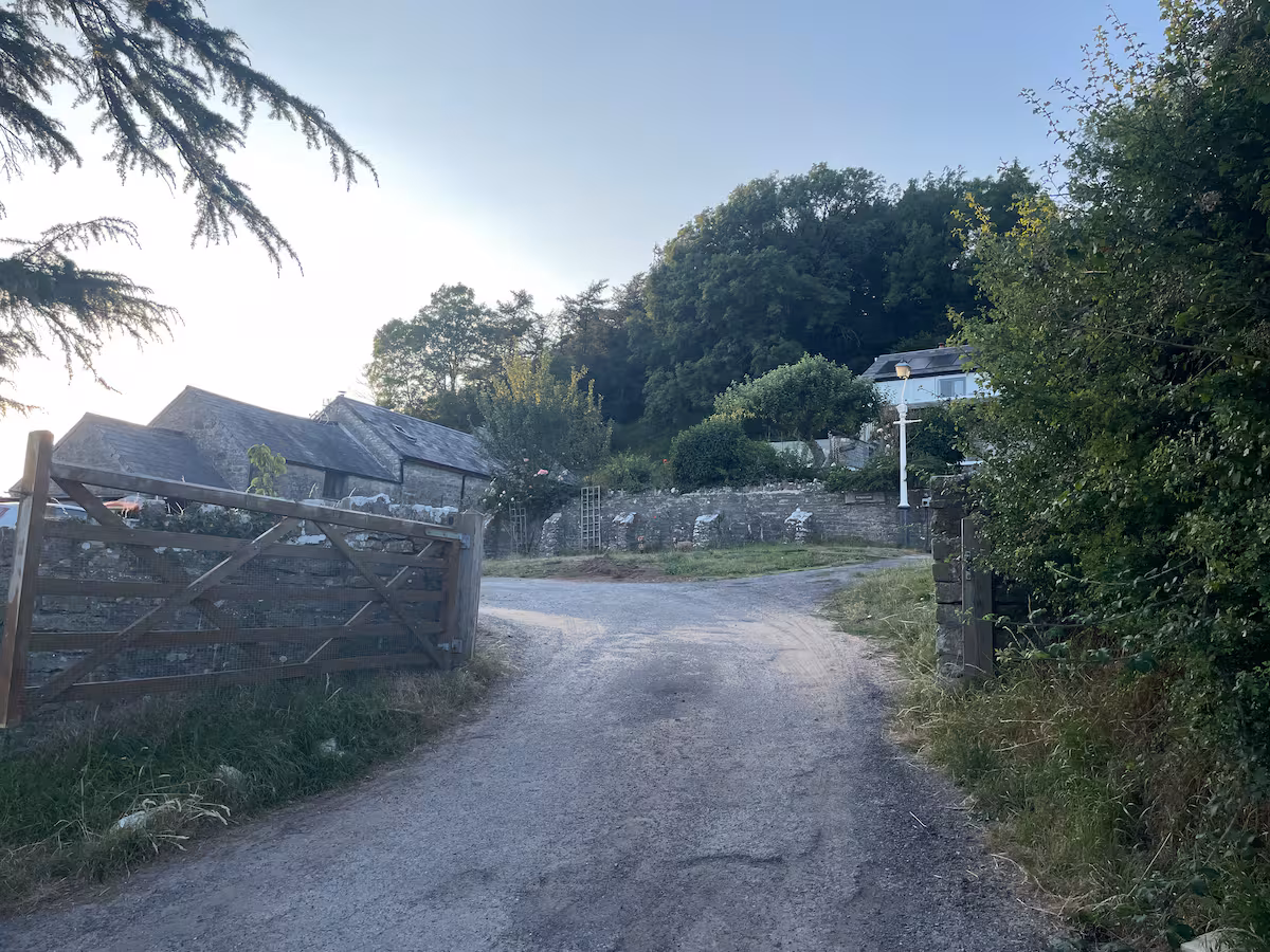 The main entrance and private track leading to The Barn
